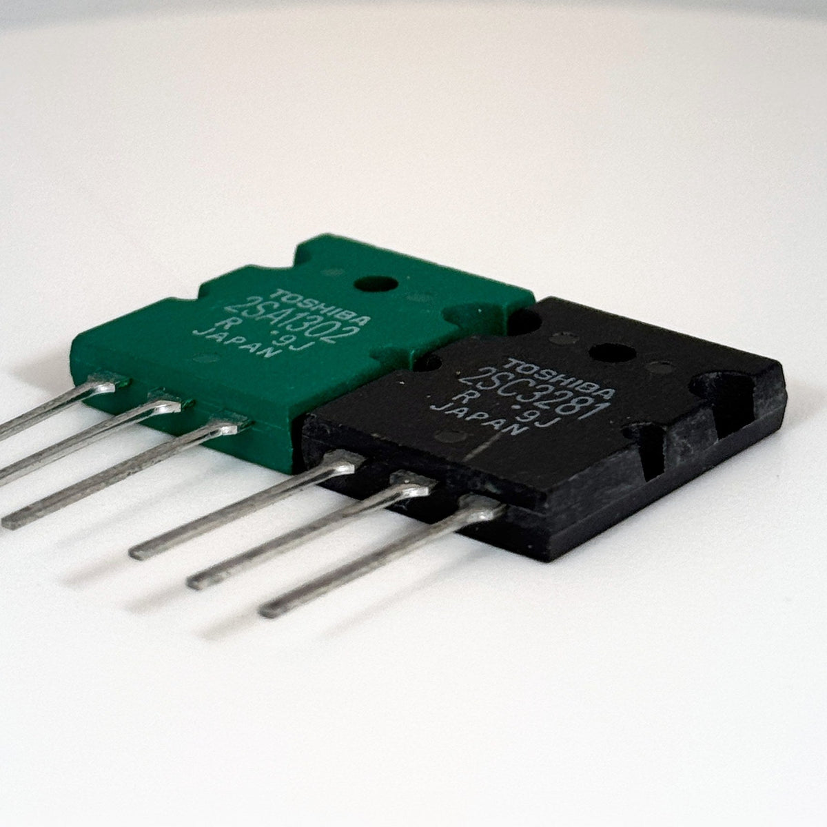 Toshiba 2SA1302 and 2SC3281 transistors, side view