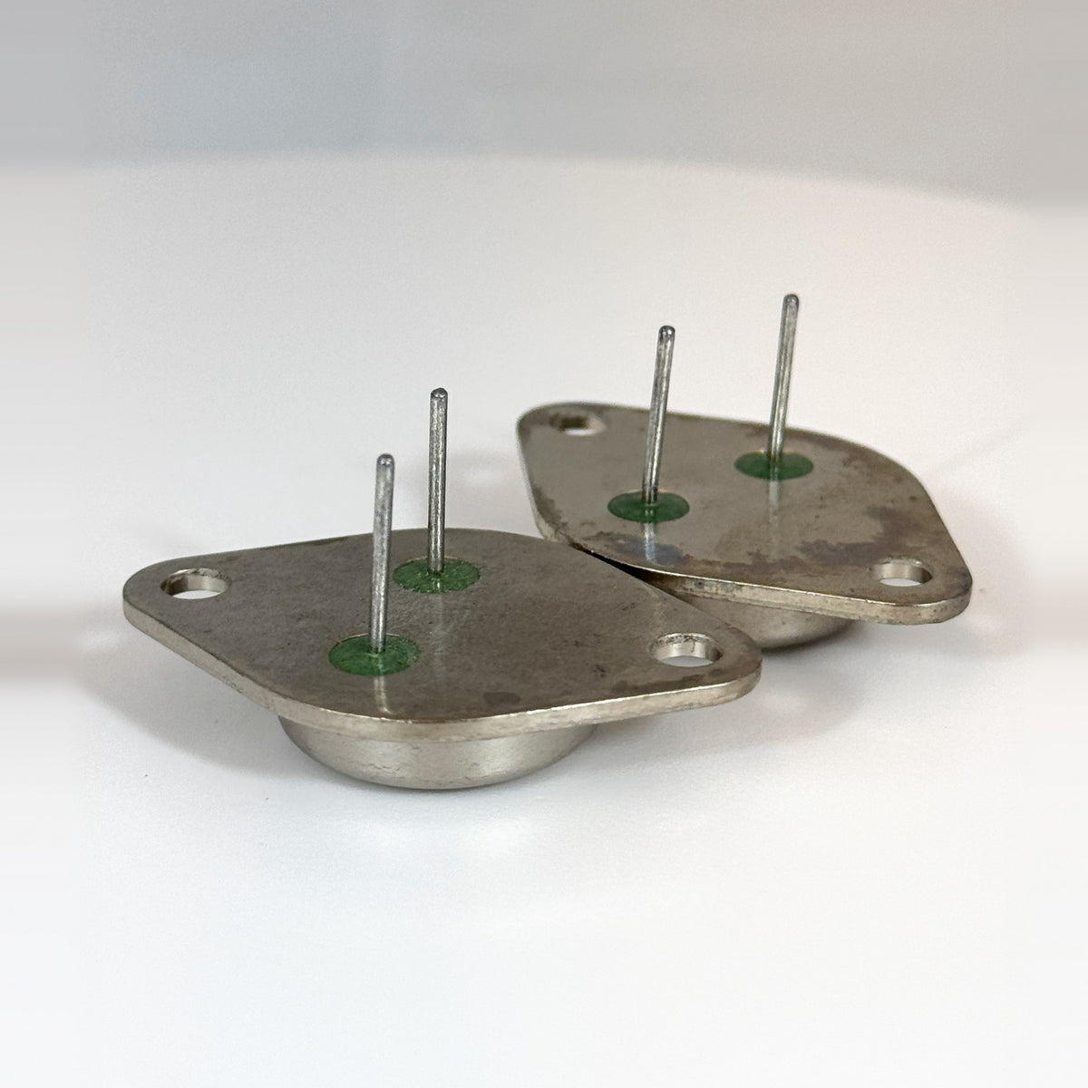 Motorola MJ15022 and MJ15023 transistors, underside with pins