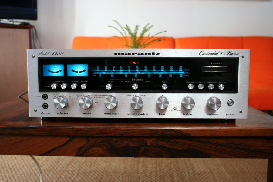 A vintage Marantz receiver on a wooden table